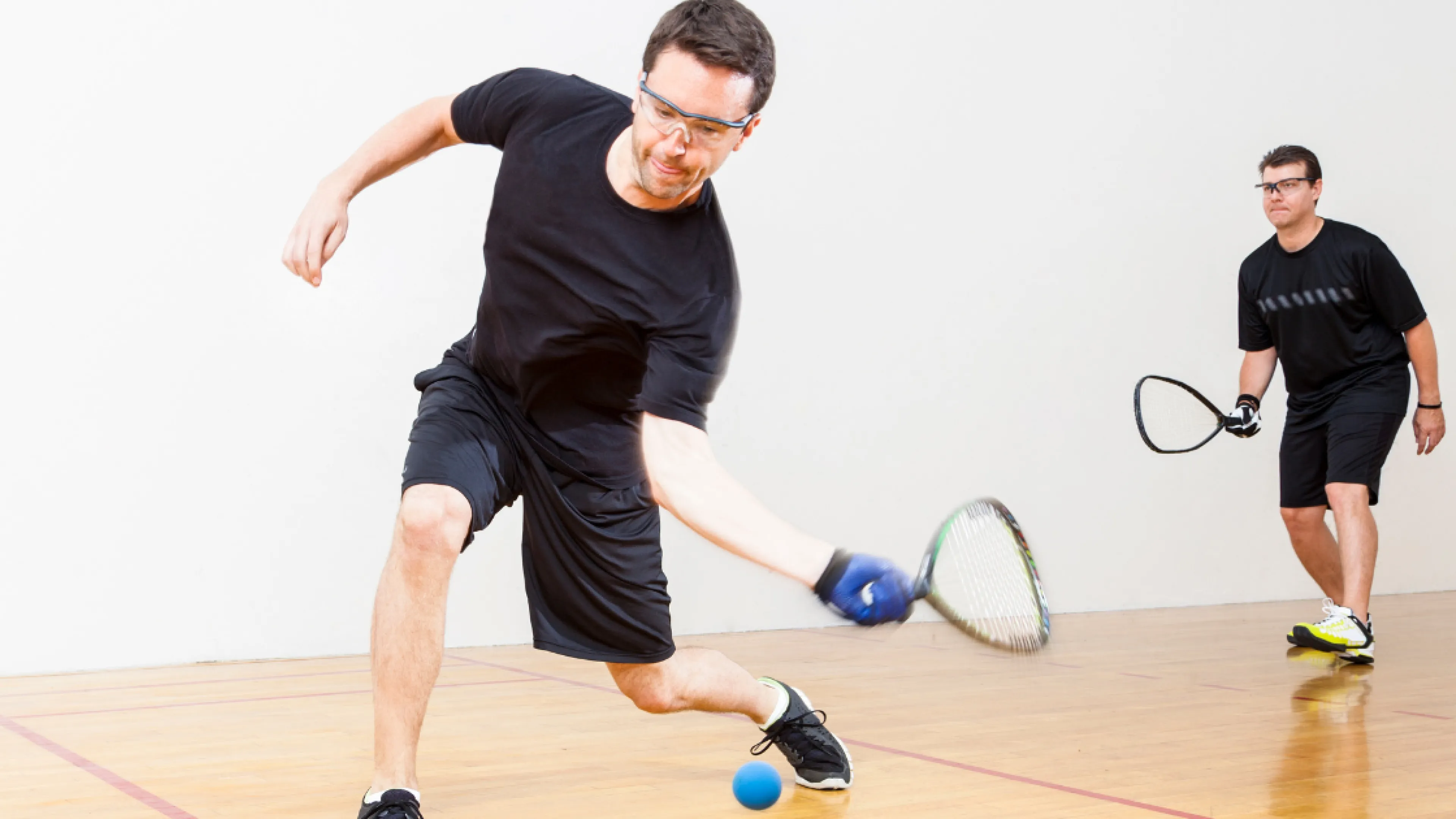 2 players playing racquetball